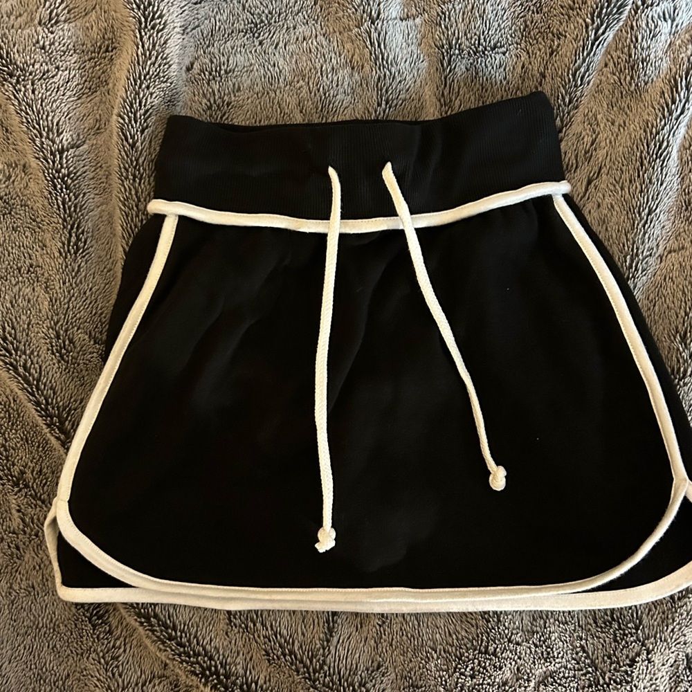 Black and white athletic skort - sweatpants material , only worn once . Size xs